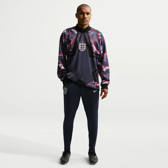 Zdjęcie produktu Męskie spodnie piłkarskie z dzianiny Nike Dri-FIT Anglia Strike - Niebieski