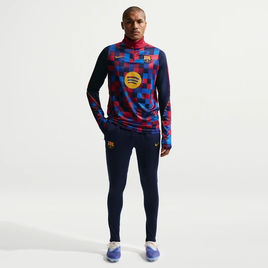 Zdjęcie produktu Męskie spodnie piłkarskie z dzianiny Nike Dri-FIT FC Barcelona Strike - Niebieski