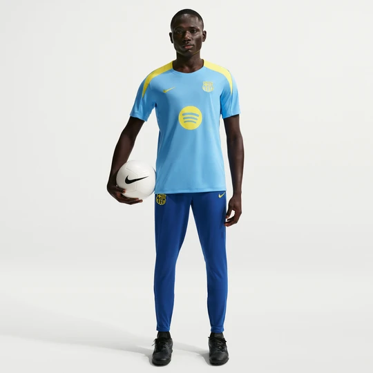 Zdjęcie produktu Męskie spodnie piłkarskie z dzianiny Nike Dri-FIT FC Barcelona Strike SE - Niebieski