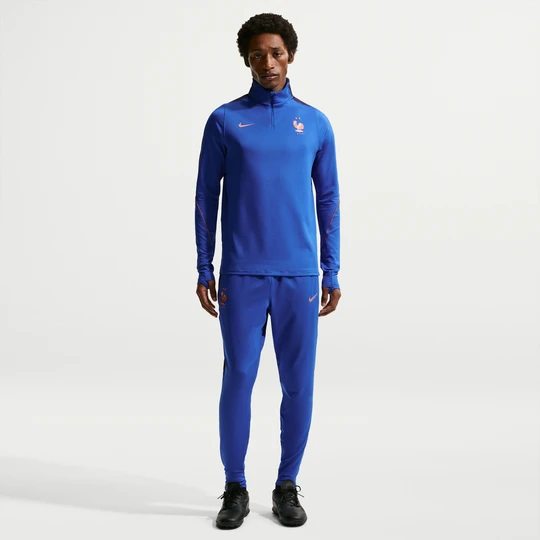 Zdjęcie produktu Męskie spodnie piłkarskie z dzianiny Nike Dri-FIT FFF Strike - Niebieski