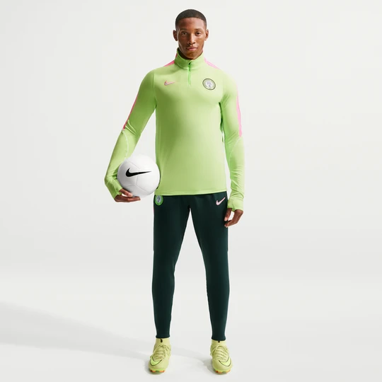 Zdjęcie produktu Męskie spodnie piłkarskie z dzianiny Nike Dri-FIT Nigeria Strike - Zieleń