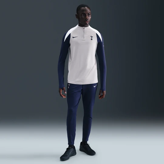 Zdjęcie produktu Męskie spodnie piłkarskie z dzianiny Nike Dri-FIT Tottenham Hotspur Strike - Niebieski