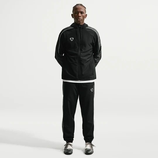 Zdjęcie produktu Męskie spodnie piłkarskie z tkaniny Repel Nike Academy+ - Czerń