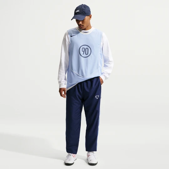 Zdjęcie produktu Męskie spodnie piłkarskie z tkaniny Repel Nike Academy+ - Niebieski