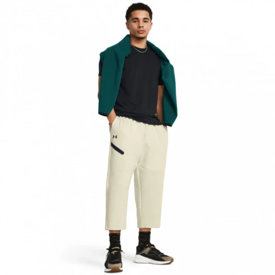 Zdjęcie produktu Męskie spodnie treningowe Under Armour Unstoppable Flc Baggy Crop - kremowe