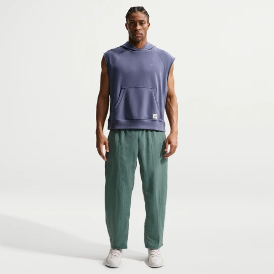Zdjęcie produktu Męskie spodnie treningowe z tkaniny Dri-FIT Nike N.A.C. - Szary