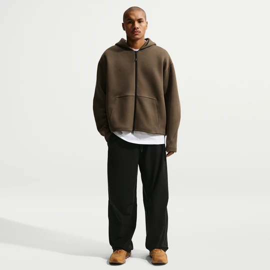 Zdjęcie produktu Męskie spodnie z dzianiny Dri-FIT Shori Nike Tech - Czerń