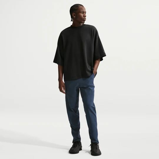 Zdjęcie produktu Męskie spodnie z dzianiny Dri-FIT Shori Nike Tech - Niebieski