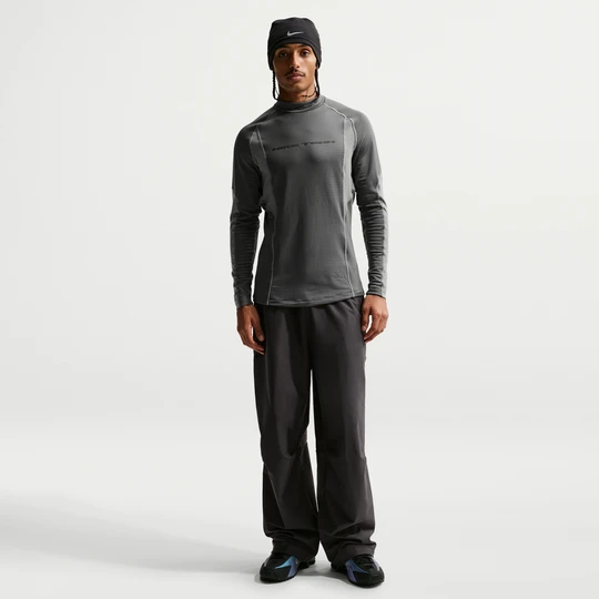 Zdjęcie produktu Męskie spodnie z dzianiny Dri-FIT Shori Nike Tech - Szary