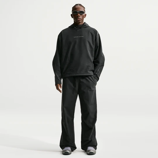 Zdjęcie produktu Męskie spodnie z dzianiny z luźnymi nogawkami Nike Tech Dri-FIT Shori - Czerń