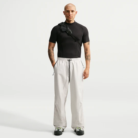 Zdjęcie produktu Męskie spodnie z dzianiny z luźnymi nogawkami Nike Tech Dri-FIT Shori - Szary