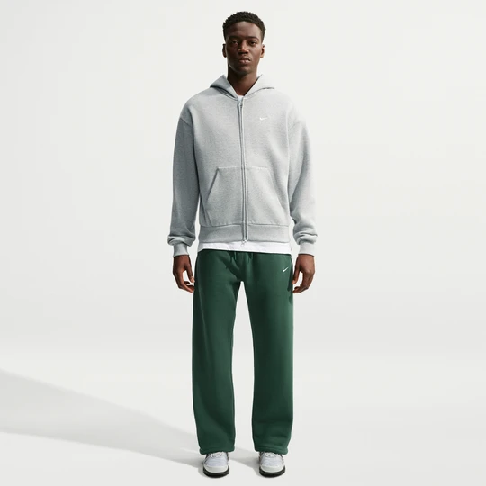 Zdjęcie produktu Męskie spodnie z elastycznym sznurkiem Nike Solo Fleece - Zieleń