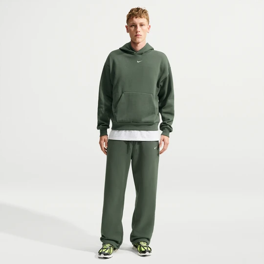 Zdjęcie produktu Męskie spodnie z elastycznym sznurkiem Nike Solo Fleece - Zieleń