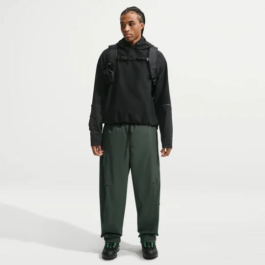 Zdjęcie produktu Męskie spodnie z luźnymi nogawkami Dri-FIT Nike Tech Helios - Zieleń