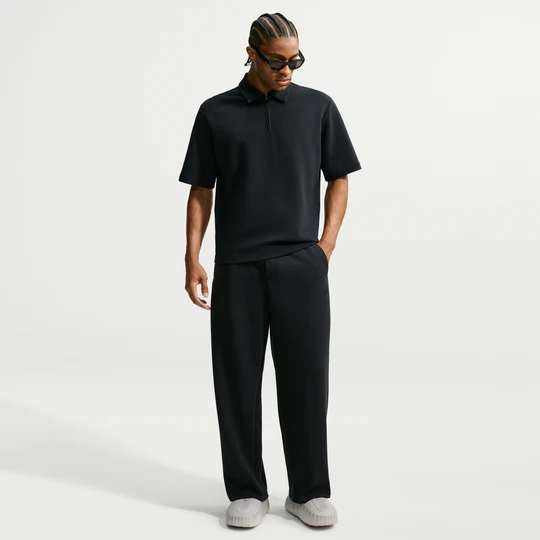 Zdjęcie produktu Męskie spodnie z prostymi nogawkami Dri-FIT Nike 24.7 ImpossiblySoft - Czerń