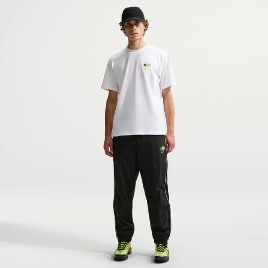 Zdjęcie produktu Męskie spodnie z tkaniny Nike - Czerń