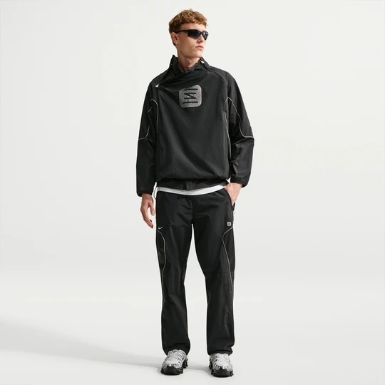 Zdjęcie produktu Męskie spodnie z tkaniny Nike - Czerń