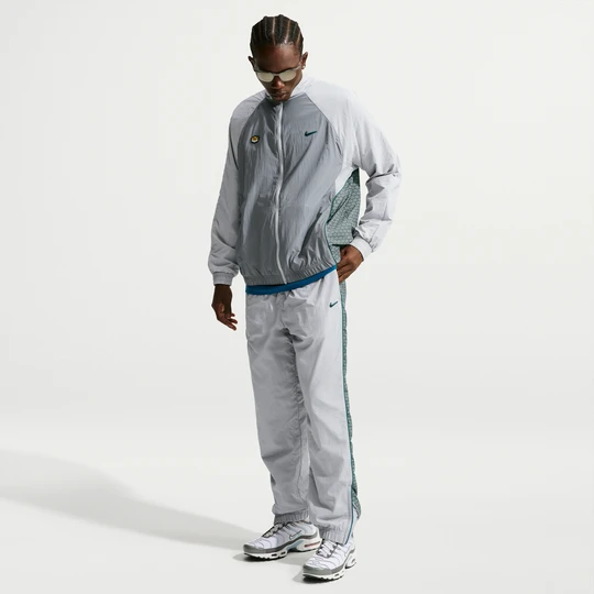 Zdjęcie produktu Męskie spodnie z tkaniny Nike - Szary