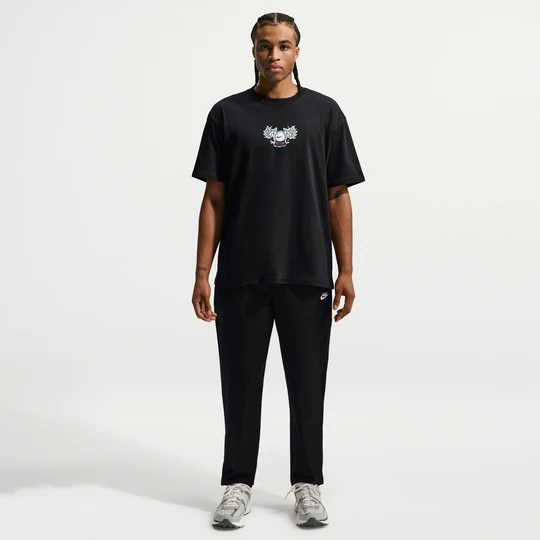 Zdjęcie produktu Męskie spodnie z tkaniny o zwężanym kroju Nike Club - Czerń