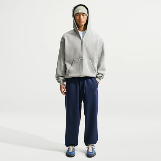 Zdjęcie produktu Męskie spodnie ze ściągaczem Nike Solo Fleece - Niebieski