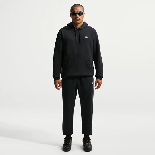 Zdjęcie produktu Męskie spodnie ze szczotkowanej dzianiny ze ściągaczami Nike Club - Czerń