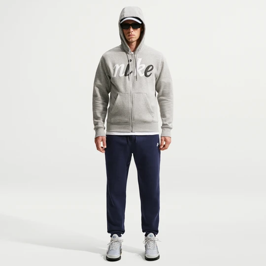 Zdjęcie produktu Męskie spodnie ze szczotkowanej dzianiny ze ściągaczami Nike Club - Niebieski