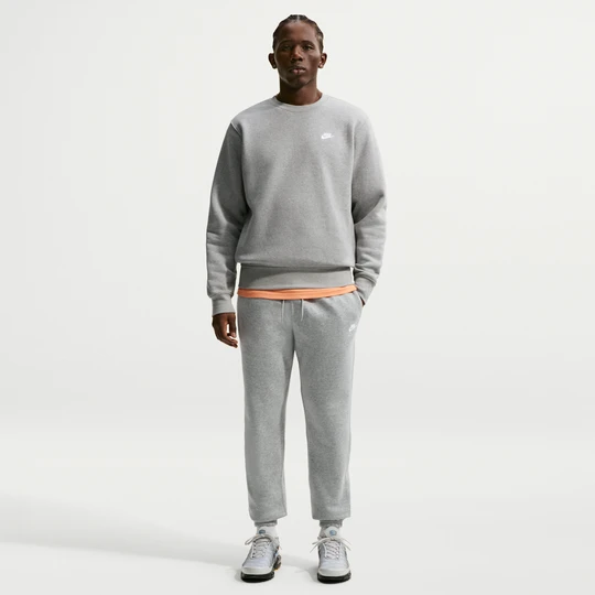 Zdjęcie produktu Męskie spodnie ze szczotkowanej dzianiny ze ściągaczami Nike Club - Szary