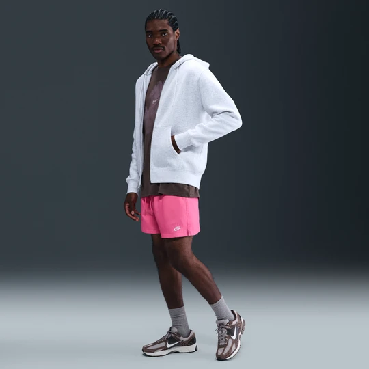 Zdjęcie produktu Męskie luźne spodenki z tkaniny Nike Club - Różowy