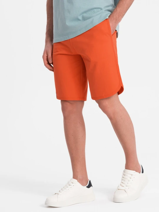 Zdjęcie produktu Męskie szorty dresowe z zaokrągloną nogawką - pomarańczowe V5 Ombre Clothing