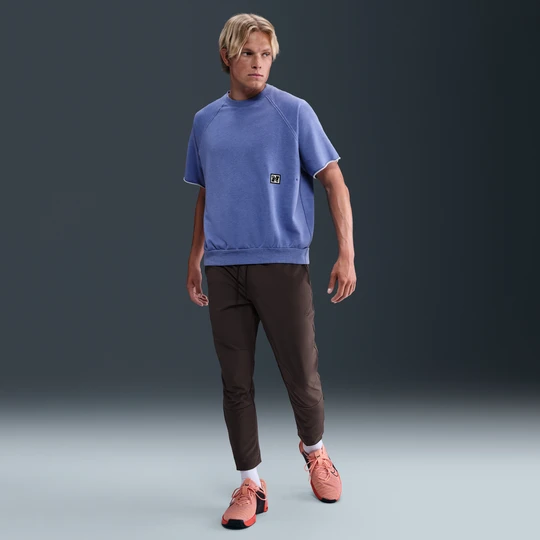 Zdjęcie produktu Męskie uniwersalne spodnie ze ściągaczami i zamkami Dri-FIT Nike Unlimited - Brązowy