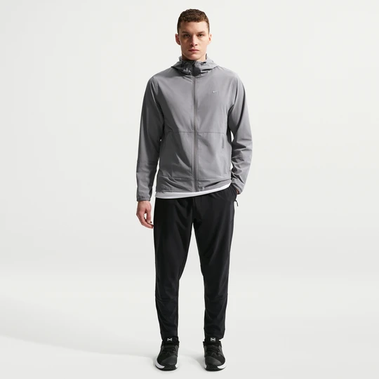 Zdjęcie produktu Męskie uniwersalne spodnie ze ściągaczami i zamkami Dri-FIT Nike Unlimited - Czerń