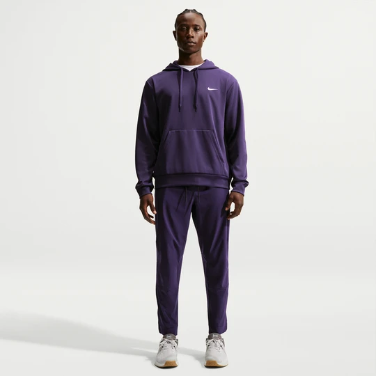 Zdjęcie produktu Męskie uniwersalne spodnie ze ściągaczami i zamkami Dri-FIT Nike Unlimited - Fiolet
