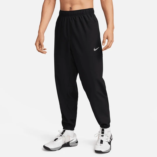 Zdjęcie produktu Męskie uniwersalne spodnie ze zwężanymi nogawkami Dri-FIT Nike Form - Czerń