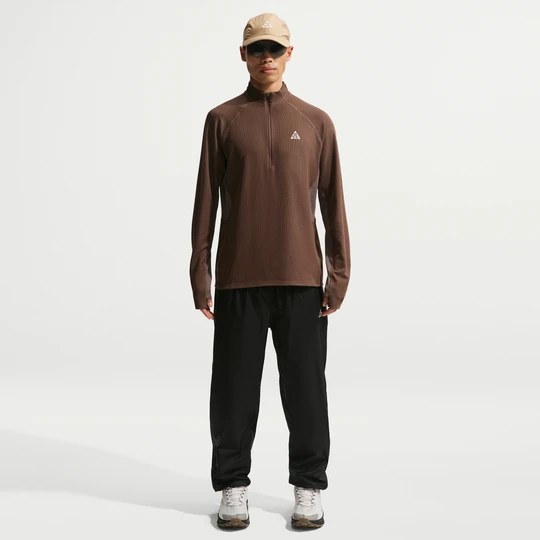 Zdjęcie produktu Męskie wodoszczelne spodnie Storm-FIT ADV Nike ACG „Trailwind” - Czerń