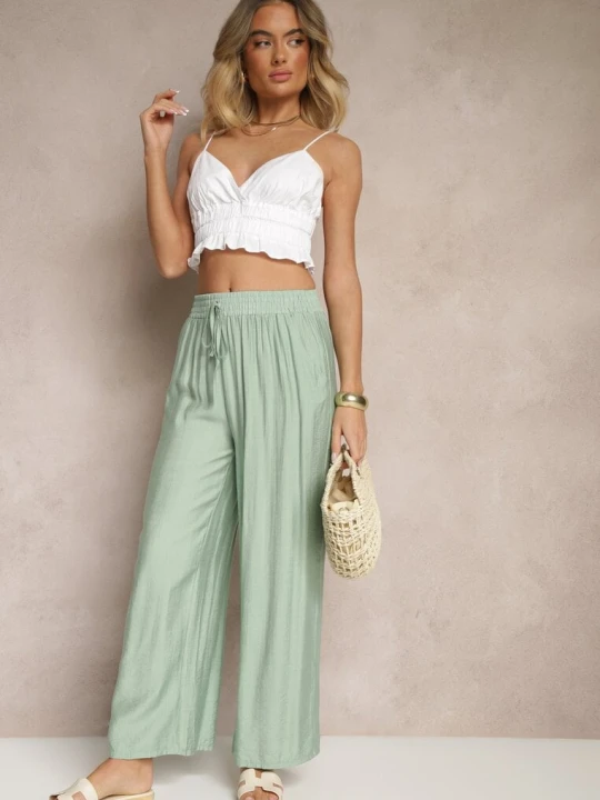 Zdjęcie produktu Miętowe Spodnie Typu Palazzo o Szerokim Kroju High Waist Ozdobione Wiązaniem Yaslevia H&s Zielony