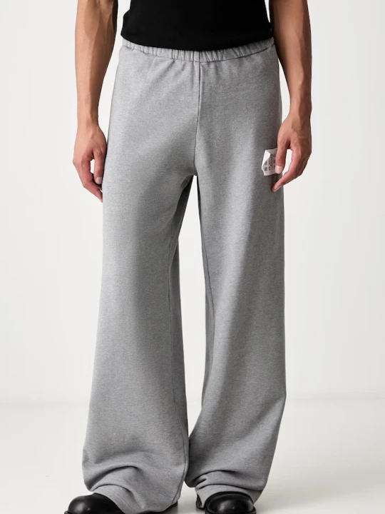 Zdjęcie produktu MM6 Maison Margiela spodnie dresowe męskie bawełniane szary