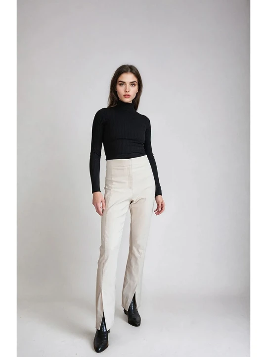 Zdjęcie produktu Monki Spodnie w kolorze kremowym rozmiar: 44