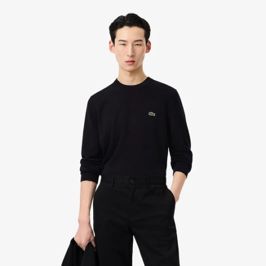 Zdjęcie produktu Monochromatyczny bawełniany sweter z okrągłym dekoltem Lacoste