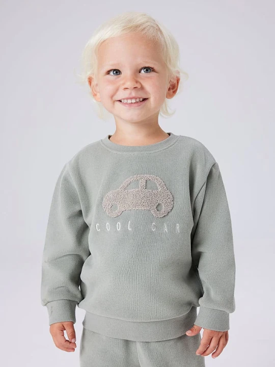 Zdjęcie produktu name it Bluza "Obear" w kolorze zielonym rozmiar: 122 / 128