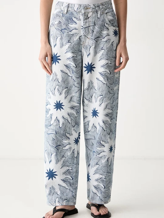 Zdjęcie produktu Never Fully Dressed jeansy relaxed fit damskie niebieski