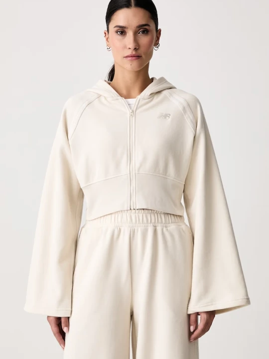 Zdjęcie produktu New Balance bluza rozpinana z kapturem damska z bawełną beżowy
