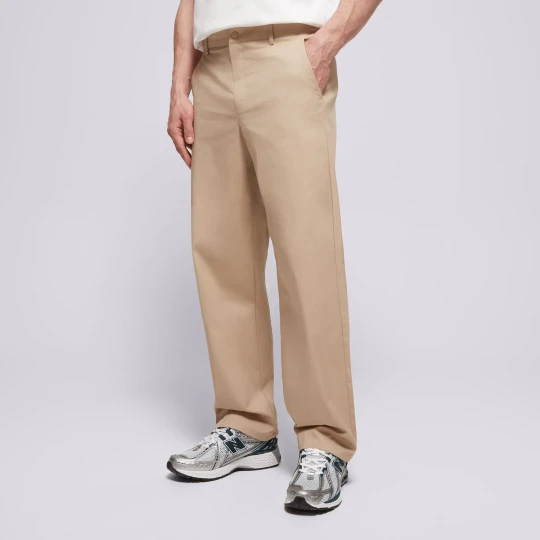 Zdjęcie produktu New Balance Spodnie Athletics Standard Pant 30" beżowy