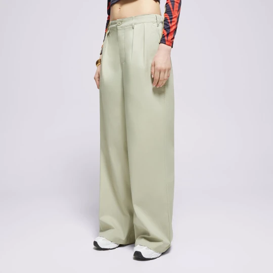 Zdjęcie produktu New Balance Spodnie Boylston Twill zielony