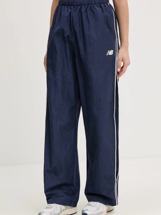 Zdjęcie produktu New Balance spodnie dresowe damskie Sport granatowy