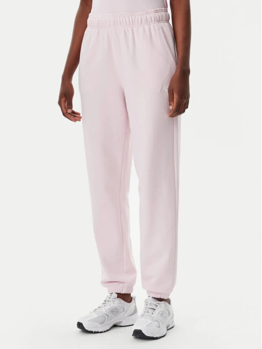 Zdjęcie produktu New Balance Spodnie dresowe Essentials WP41500 Różowy Relaxed Fit
