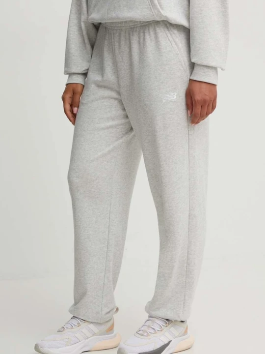 Zdjęcie produktu New Balance spodnie dresowe French Terry Crew szary