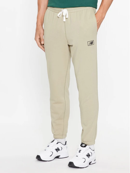 Zdjęcie produktu New Balance Spodnie dresowe NB Essentials Sweatpant MP33509 Zielony Regular Fit