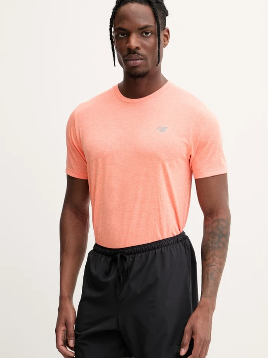 Zdjęcie produktu New Balance T-shirt treningowy męski pomarańczowy