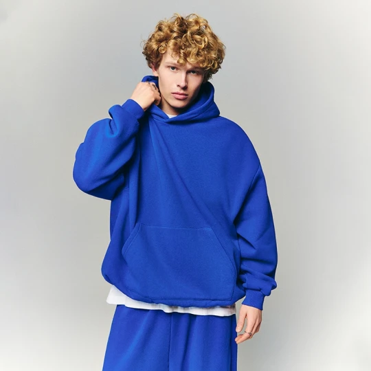 Zdjęcie produktu Niebieska bluza bombka z kapturem basic House