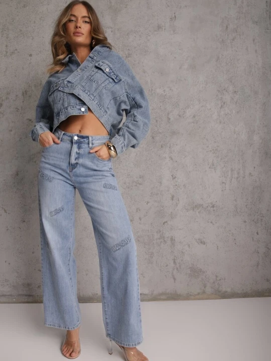 Zdjęcie produktu Niebieskie Szerokie Jeansy High Waist z Ozdobnymi Naszywkami Hleffia Milas91